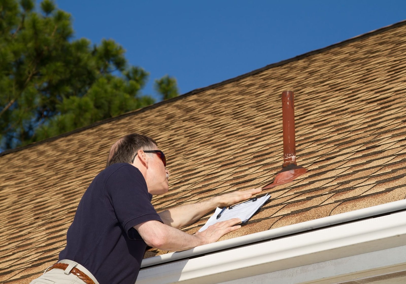 Roofing crew working on a premium roof